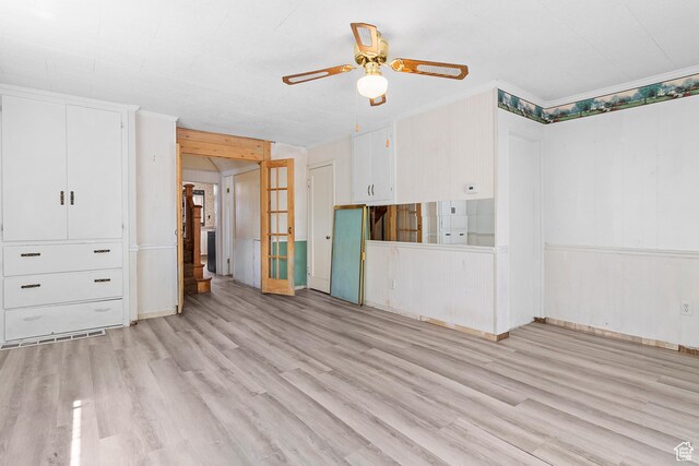 394 W 100 N, Mount Pleasant, UT 84647 - unfurnished living room featuring a ceiling fan, light wood-style flooring, and ornamental molding