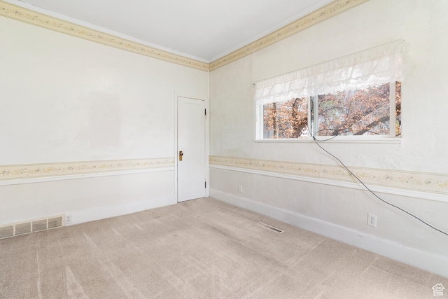 394 W 100 N, Mount Pleasant, UT 84647 - spare room with visible vents, crown molding, and light colored carpet