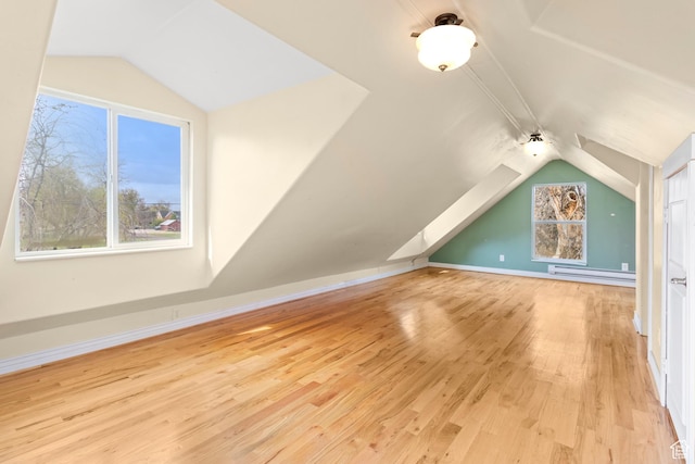 394 W 100 N, Mount Pleasant, UT 84647 - bonus room with wood finished floors, baseboards, lofted ceiling, and a baseboard heating unit