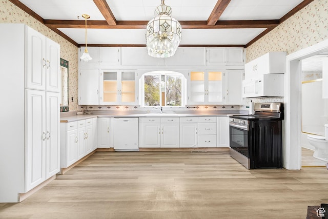 394 W 100 N, Mount Pleasant, UT 84647 - kitchen with an inviting chandelier, wallpapered walls, white appliances, and beam ceiling