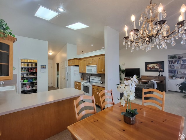 529 S 120 E, Smithfield, UT 84335 - dining space with light colored carpet, a notable chandelier, built in shelves, and lofted ceiling