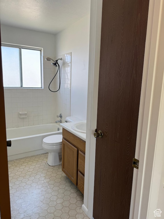 full bath with toilet, shower / washtub combination, and vanity