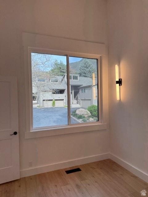4758 S Ichabod St, Holladay, UT 84117 - spare room with baseboards, visible vents, and light wood-style floors