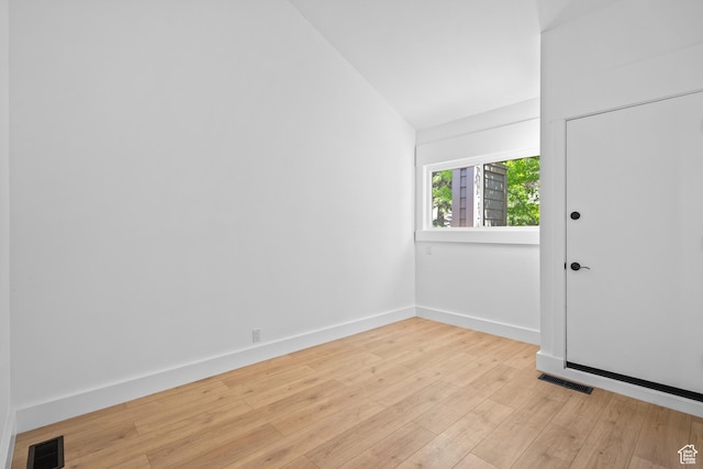 4758 S Ichabod St, Holladay, UT 84117 - spare room featuring hardwood / wood-style flooring and lofted ceiling