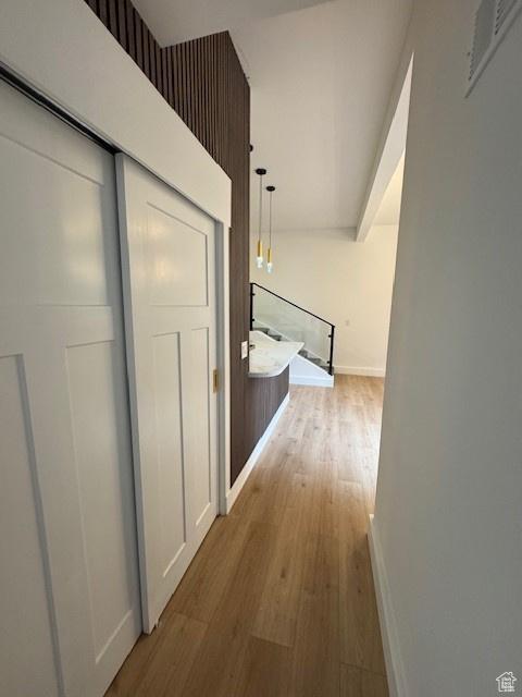 4758 S Ichabod St, Holladay, UT 84117 - hallway featuring visible vents, baseboards, and wood finished floors
