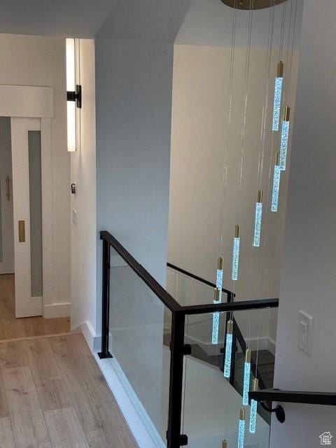 4758 S Ichabod St, Holladay, UT 84117 - staircase featuring baseboards and wood finished floors