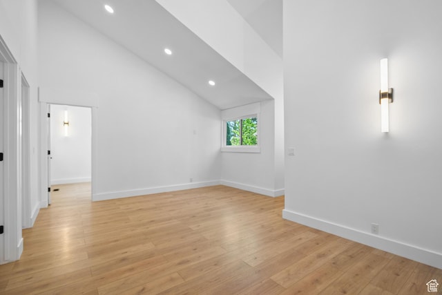 4758 S Ichabod St, Holladay, UT 84117 - empty room with recessed lighting, light wood-style flooring, and high vaulted ceiling