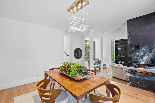 4758 S Ichabod St, Holladay, UT 84117 - dining room featuring light wood finished floors and baseboards