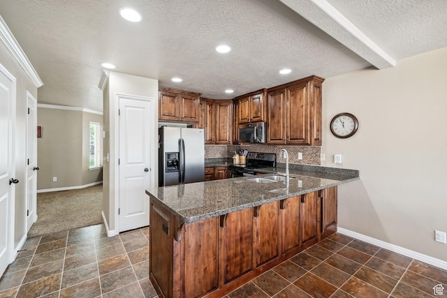 1069 N Independence Ave, Provo, UT 84604 - kitchen with stainless steel appliances, a peninsula, baseboards, a textured ceiling, and brown cabinetry