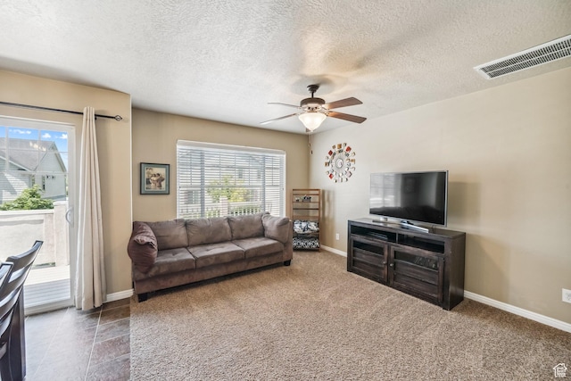 1069 N Independence Ave, Provo, UT 84604 - living area with a ceiling fan, baseboards, a textured ceiling, and carpet