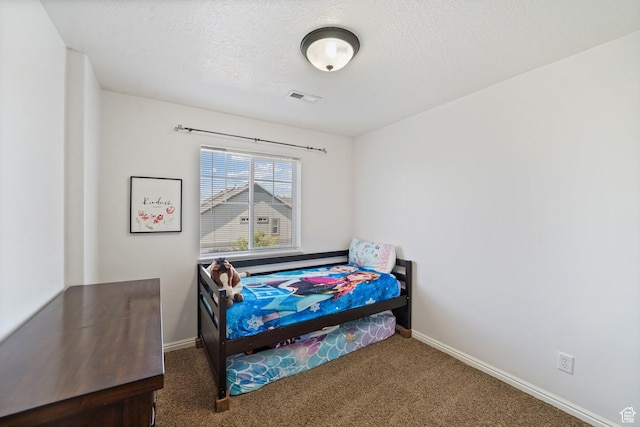 1069 N Independence Ave, Provo, UT 84604 - carpeted bedroom featuring baseboards and a textured ceiling