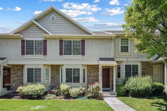 1069 N Independence Ave, Provo, UT 84604 - multi unit property with stone siding, stucco siding, and a front lawn