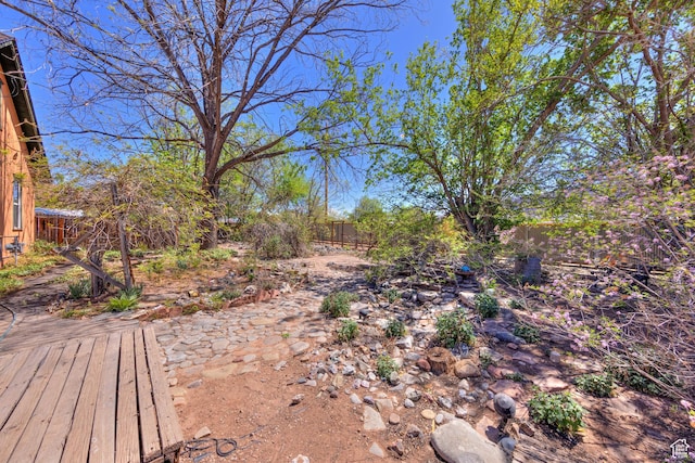 210 S 400 E, Moab, UT 84532 - fenced backyard with a wooden deck
