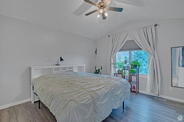 1976 N 1720 W, Clinton, UT 84015 - bedroom featuring a textured ceiling, wood finished floors, and visible vents