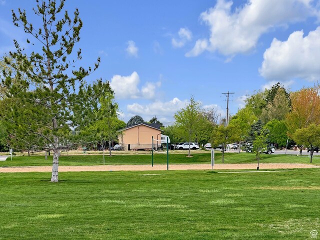 1976 N 1720 W, Clinton, UT 84015 - view of home's community with volleyball court and a yard