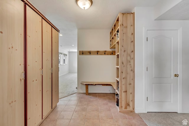 11362 Palisade View Dr, South Jordan, UT 84095 - mudroom featuring light tile patterned floors, baseboards, light carpet, and recessed lighting