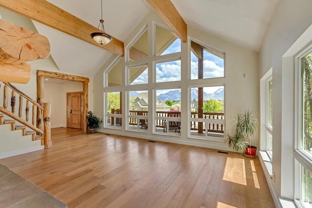11362 Palisade View Dr, South Jordan, UT 84095 - interior space featuring stairs, wood finished floors, a wealth of natural light, and high vaulted ceiling