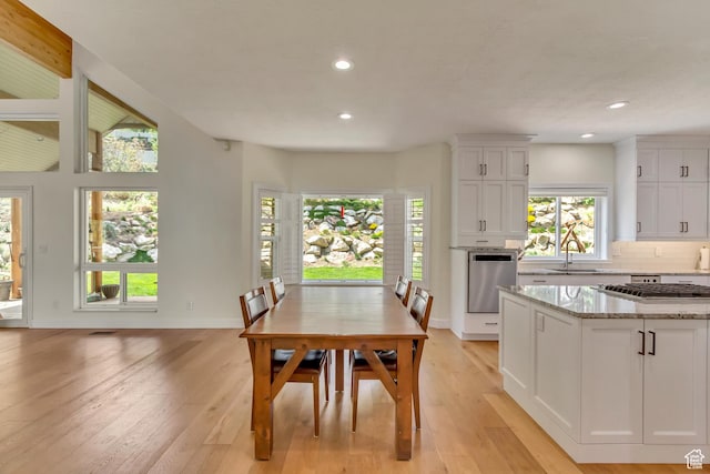 11362 Palisade View Dr, South Jordan, UT 84095 - dining space with recessed lighting, light wood-style floors, and baseboards