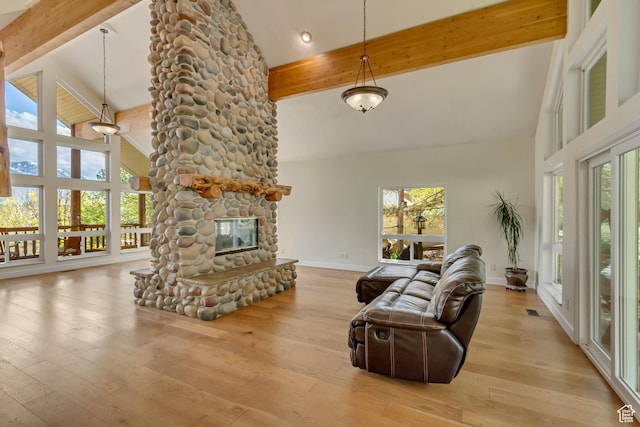 11362 Palisade View Dr, South Jordan, UT 84095 - living room featuring a fireplace, high vaulted ceiling, baseboards, wood finished floors, and beamed ceiling
