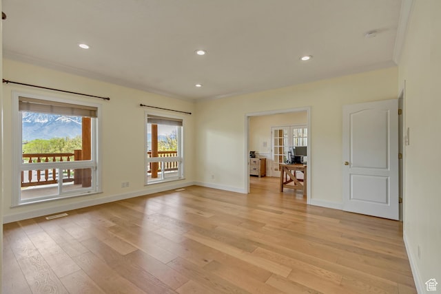 11362 Palisade View Dr, South Jordan, UT 84095 - unfurnished room featuring baseboards, french doors, and light wood-style flooring