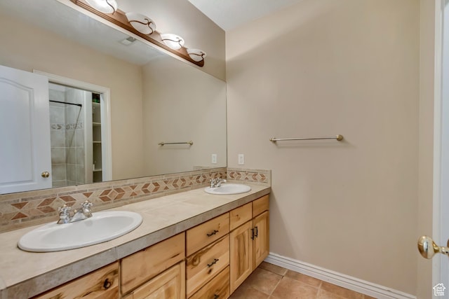 11362 Palisade View Dr, South Jordan, UT 84095 - full bath with backsplash, double vanity, baseboards, and a sink