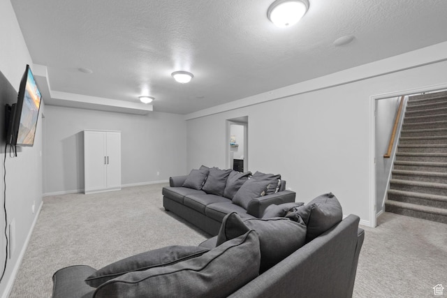 10751 S Pine Shadow Rd W, South Jordan, UT 84009 - living room featuring light colored carpet, a textured ceiling, stairway, and baseboards