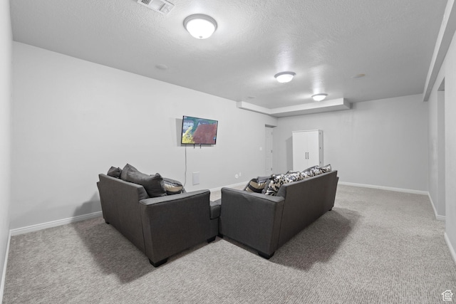 10751 S Pine Shadow Rd W, South Jordan, UT 84009 - cinema featuring light carpet, a textured ceiling, and baseboards