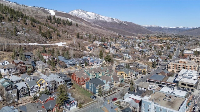 birds eye view of property with a residential view and a mountain view