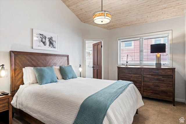 carpeted bedroom with vaulted ceiling