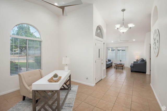 1864 S Crockett Cir, Bloomington, UT 84790 - interior space featuring recessed lighting, baseboards, light tile patterned floors, and ceiling fan with notable chandelier