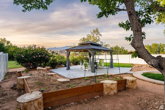 1864 S Crockett Cir, Bloomington, UT 84790 - view of community with a patio, a gazebo, and fence private yard