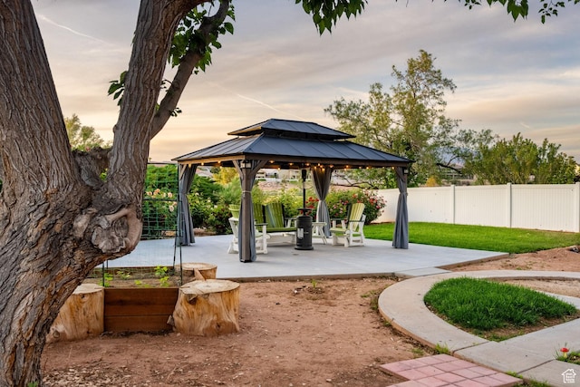 1864 S Crockett Cir, Bloomington, UT 84790 - surrounding community featuring a gazebo, fence, and a patio area