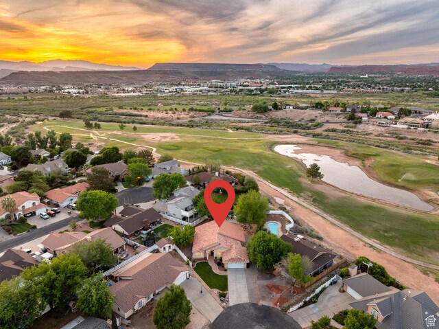1864 S Crockett Cir, Bloomington, UT 84790 - birds eye view of property featuring view of golf course, a mountain view, and a residential view