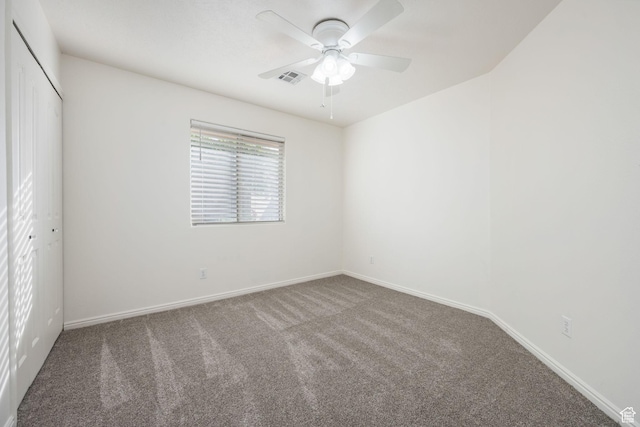 1864 S Crockett Cir, Bloomington, UT 84790 - unfurnished bedroom featuring carpet flooring, baseboards, visible vents, and a closet