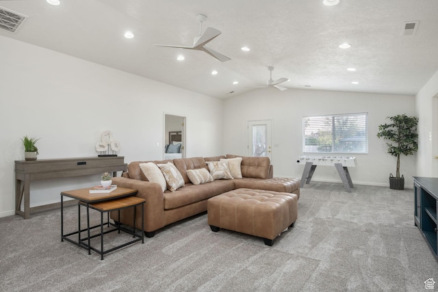 1864 S Crockett Cir, Bloomington, UT 84790 - living area featuring visible vents, light carpet, and vaulted ceiling