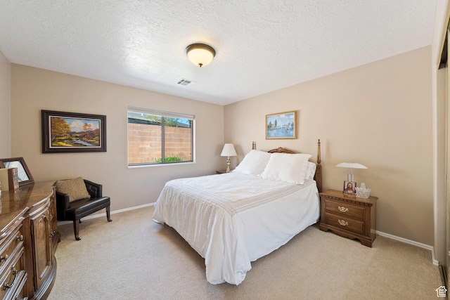 1026 Wesley Powell Dr, St George, UT 84790 - bedroom featuring light colored carpet, baseboards, and visible vents
