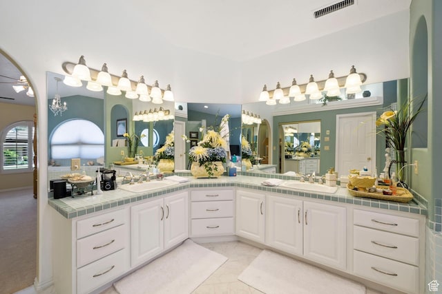 1026 Wesley Powell Dr, St George, UT 84790 - full bath with visible vents, a sink, and double vanity