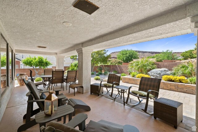 1026 Wesley Powell Dr, St George, UT 84790 - view of patio featuring outdoor dining space and a fenced backyard