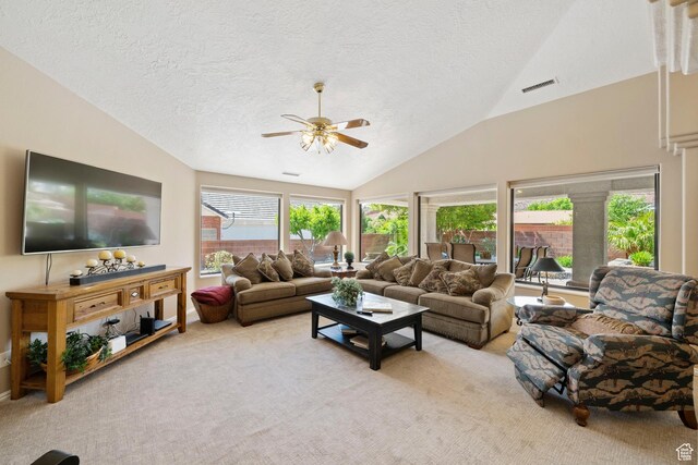 1026 Wesley Powell Dr, St George, UT 84790 - living room featuring a textured ceiling, ceiling fan, light colored carpet, and lofted ceiling