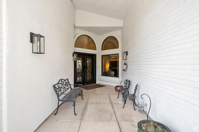 1026 Wesley Powell Dr, St George, UT 84790 - entrance to property featuring french doors and stucco siding