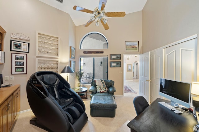 1026 Wesley Powell Dr, St George, UT 84790 - office area featuring light colored carpet, a ceiling fan, baseboards, and high vaulted ceiling