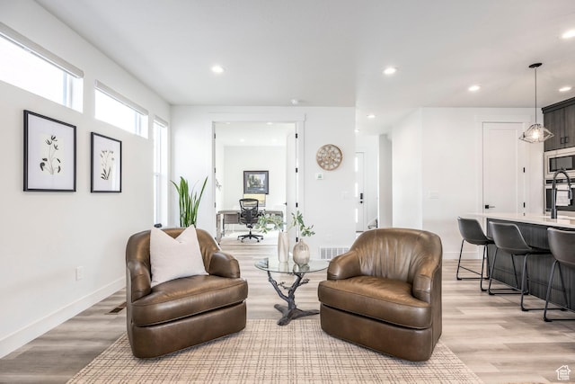 883 E Sydnee View Ln, Millcreek, UT 84107 - sitting room featuring recessed lighting, light wood-style flooring, and baseboards