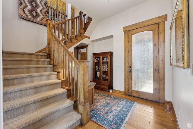 3250 E Thunderhawk Trl, Heber City, UT 84036 - entryway featuring a healthy amount of sunlight, baseboards, stairs, and hardwood / wood-style floors