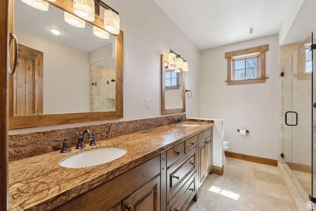 3250 E Thunderhawk Trl, Heber City, UT 84036 - full bathroom featuring double vanity, toilet, a sink, and a stall shower