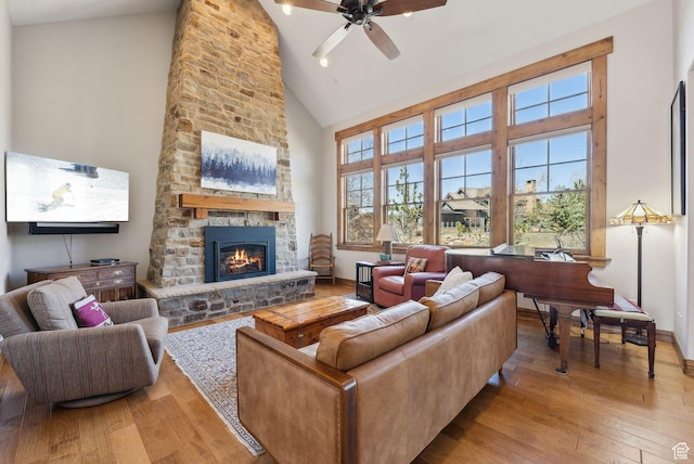 3250 E Thunderhawk Trl, Heber City, UT 84036 - living room with a ceiling fan, high vaulted ceiling, baseboards, and light wood-style floors