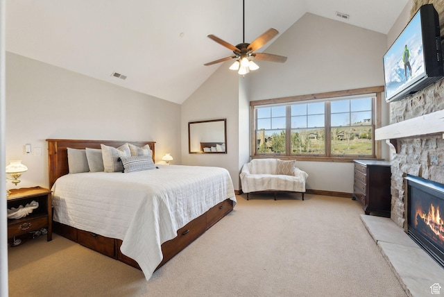 3250 E Thunderhawk Trl, Heber City, UT 84036 - bedroom featuring a ceiling fan, visible vents, a fireplace, high vaulted ceiling, and light carpet