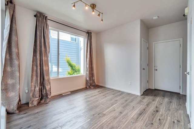11611 S Alexandria W, South Jordan, UT 84009 - unfurnished room with baseboards, light wood finished floors, and visible vents