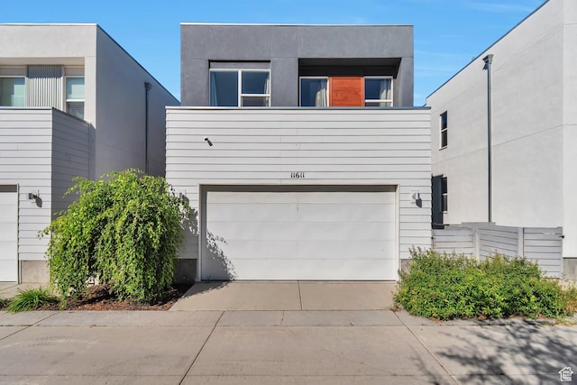 11611 S Alexandria W, South Jordan, UT 84009 - contemporary home featuring an attached garage and concrete driveway