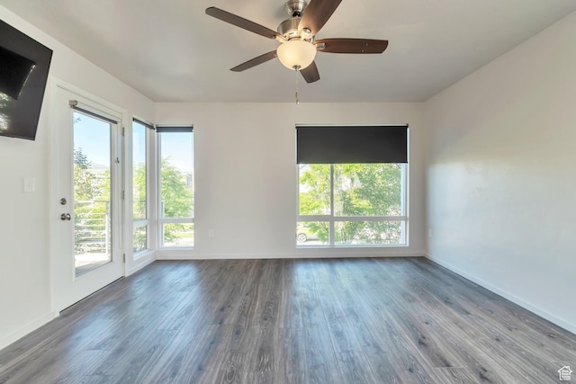 11611 S Alexandria W, South Jordan, UT 84009 - unfurnished room featuring baseboards, a wealth of natural light, and wood finished floors