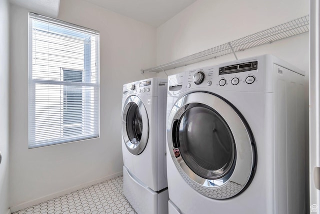 11611 S Alexandria W, South Jordan, UT 84009 - laundry room with washer and dryer, laundry area, baseboards, and light floors